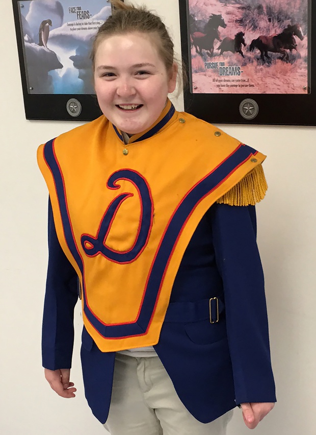 One of Dixon's current students displaying the old Dixon Marching Band regalia.