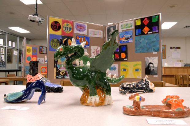 Juan Medina's clay dragon soars among other clay projects.